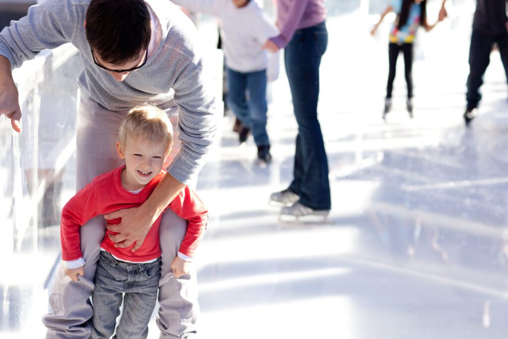 A family goes ice skating