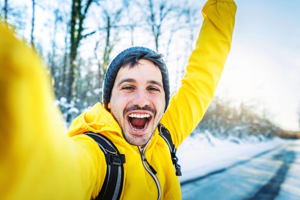 A man celebrates Aspen Gay Ski Week.