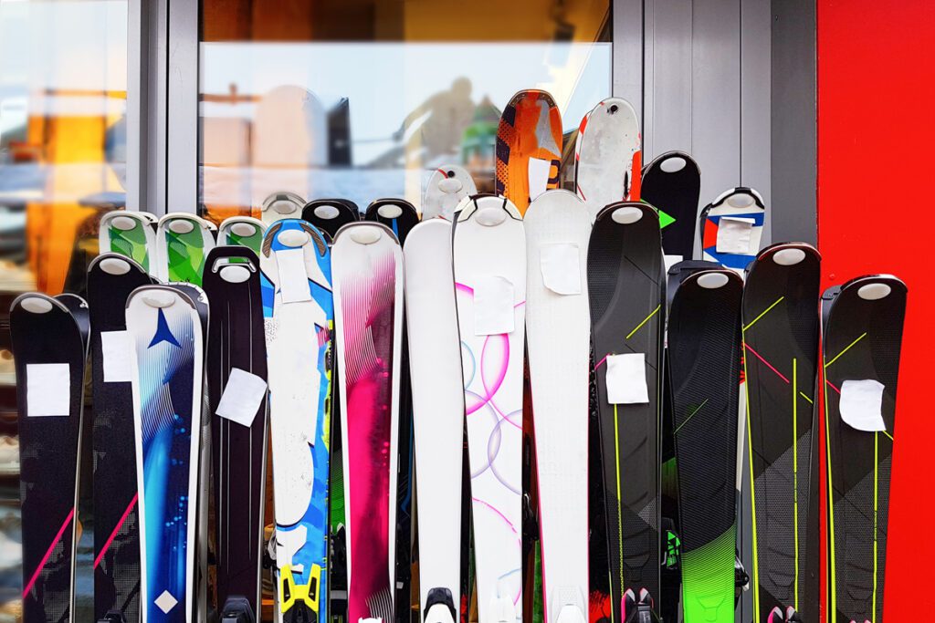 Ski gear sits outside a ski shop.