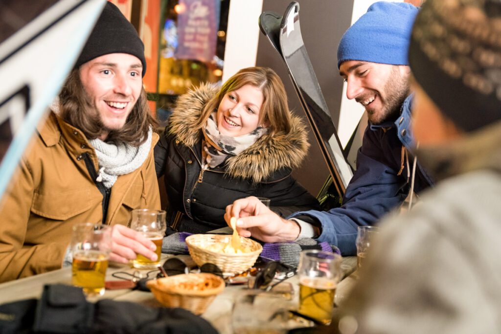 Young people relax at a ski lodge