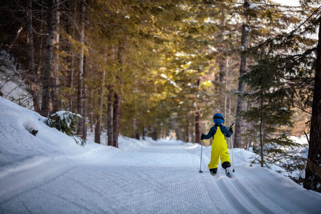 A youngster skis a private trail.