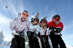 4-teens-smiling-ski-slopes