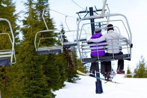 back-of-couple-on-a-chair-lift