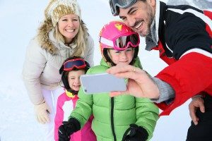 family-selfie-skiing