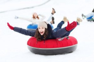 tubing-downhill-woman