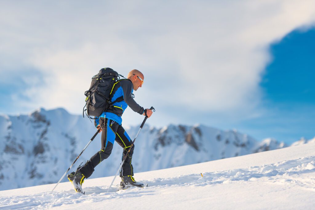 Uphill ski bindings release the heel from the ski so you can simulate walking up the mountain.