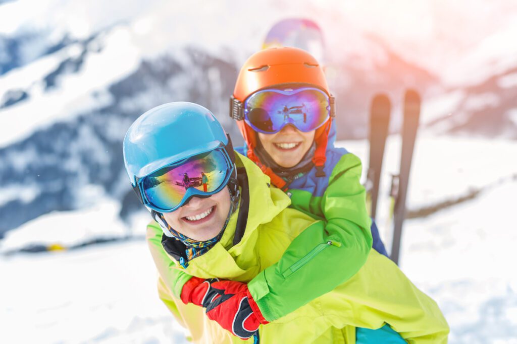 Happy family goes skiing in Colorado.