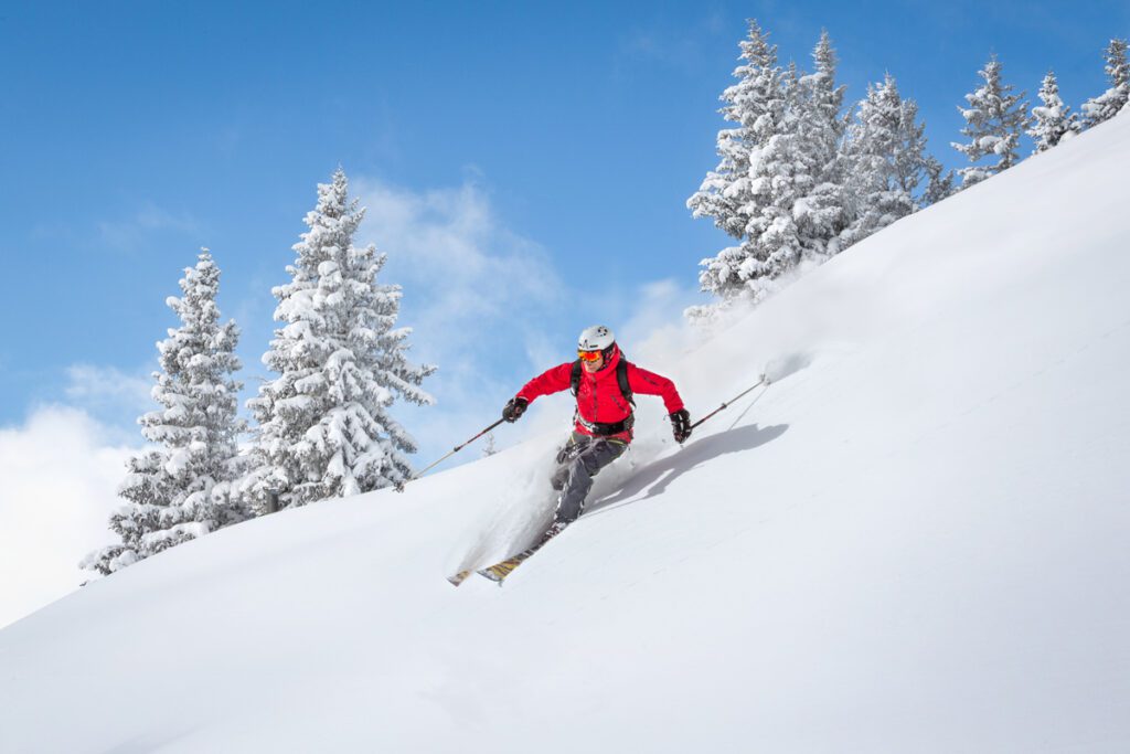 A man skis powder in Alaska