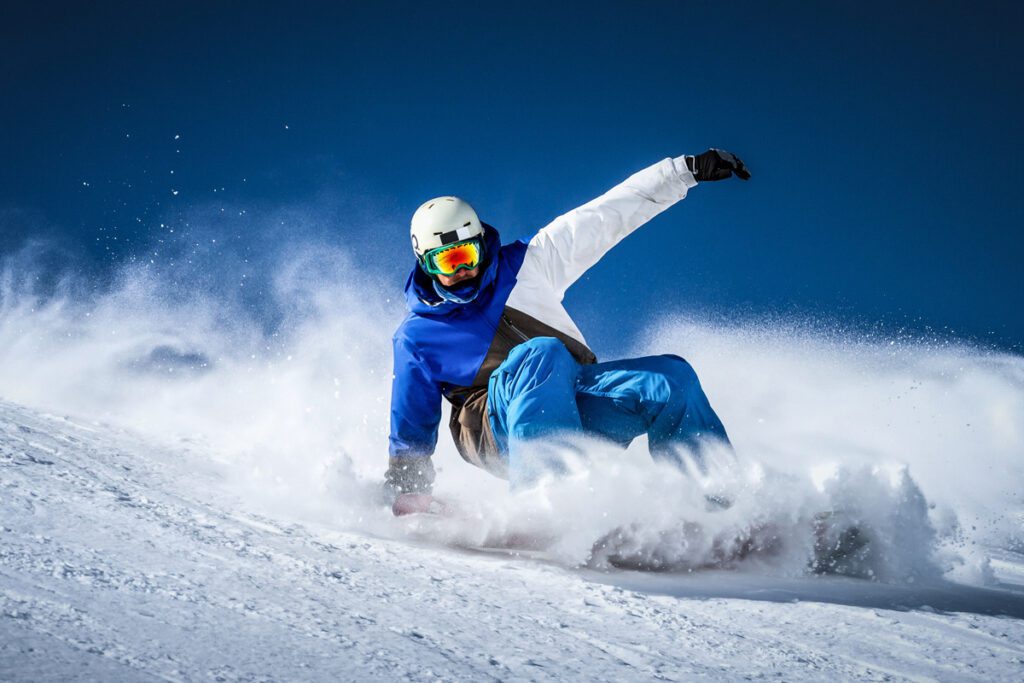 Snowboarding in powder.