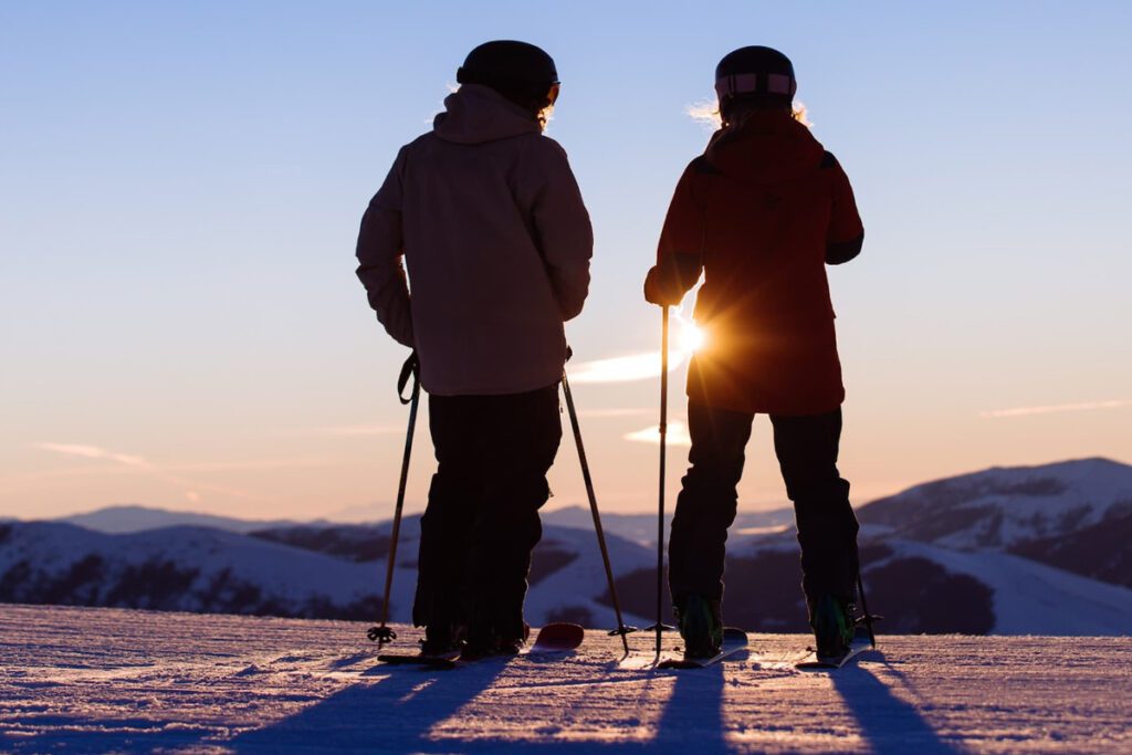 A couple looks on from the top of Bald Mountain in Idaho.