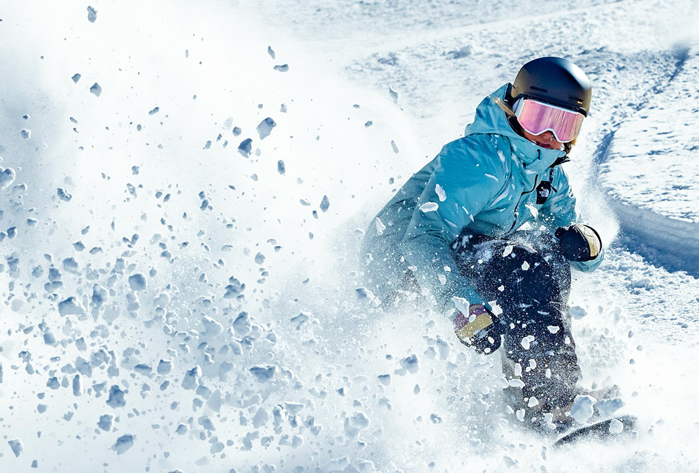 a snowboarder in powder snow